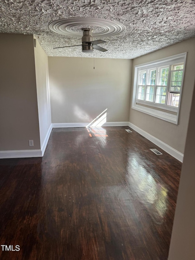 405 Whitfield Dr, Goldsboro, NC 27530 - unfurnished dining area featuring ceiling fan, wood finished floors, and baseboards