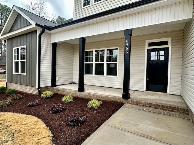 entrance to property with covered porch