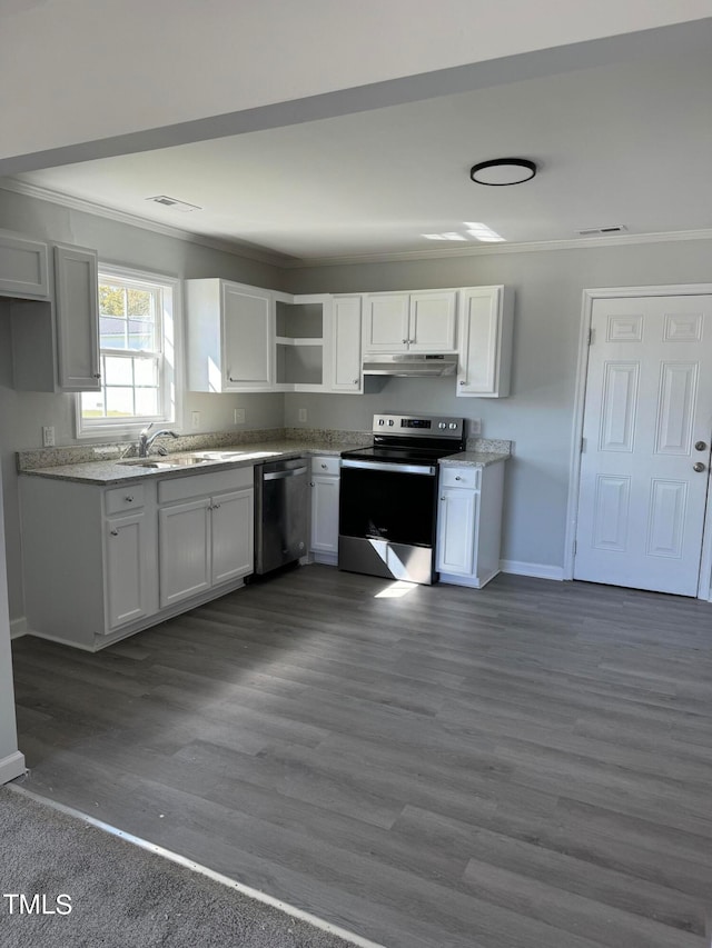 kitchen featuring dark hardwood / wood-style floors, stainless steel appliances, ornamental molding, sink, and white cabinetry