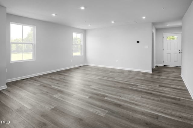 spare room featuring dark hardwood / wood-style floors