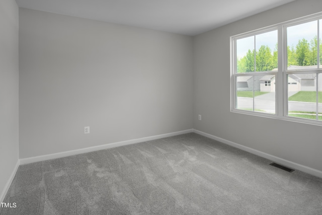 spare room with carpet flooring