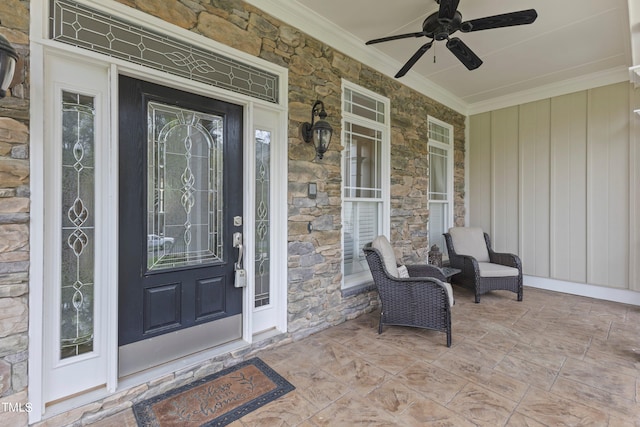 property entrance featuring covered porch and ceiling fan