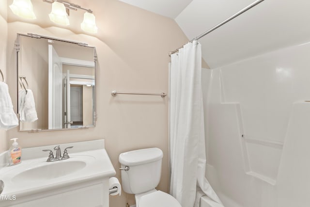 full bathroom featuring toilet, shower / bath combo, vanity, and vaulted ceiling