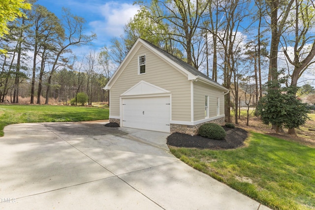 garage with a yard