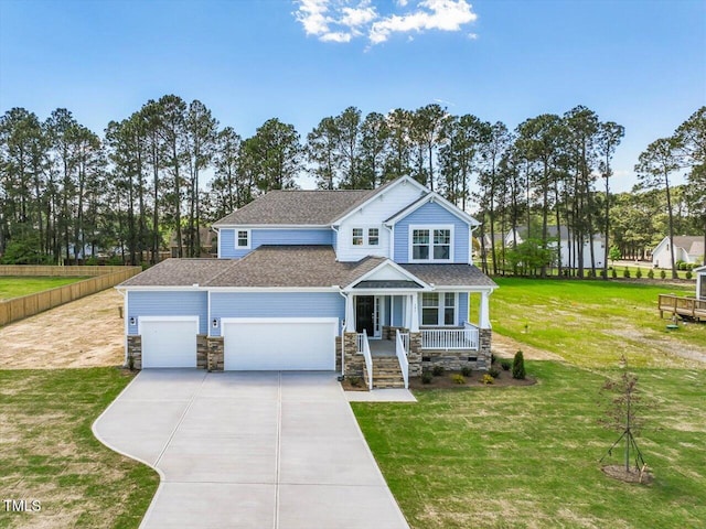 236 Alden Way, Angier, NC 27501 - craftsman inspired home featuring stone siding, a front yard, concrete driveway, an attached garage, and a porch