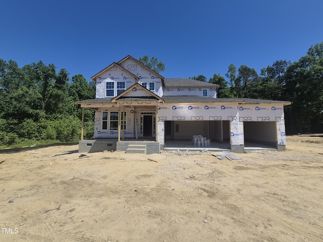 236 Alden Way, Angier, NC 27501 - property under construction featuring a garage and covered porch