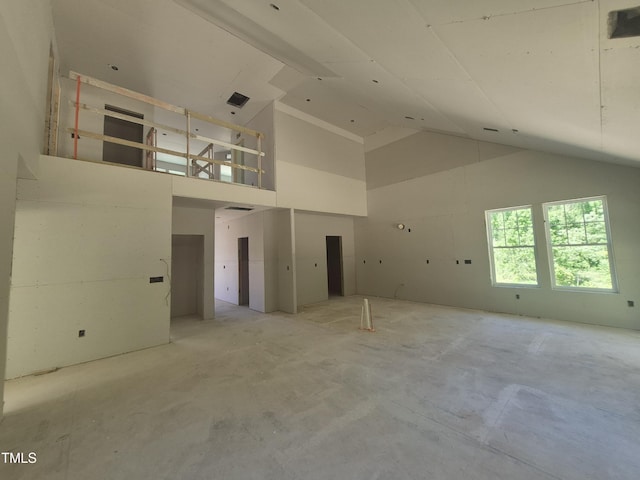 236 Alden Way, Angier, NC 27501 - unfurnished living room with concrete flooring and high vaulted ceiling