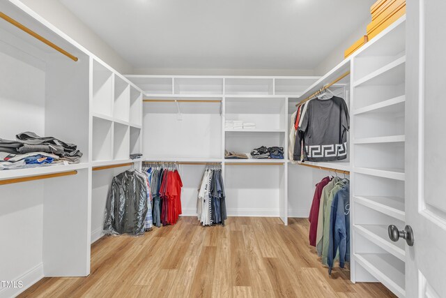616 Silver Comet Dr, Knightdale, NC 27545 - spacious closet featuring wood finished floors