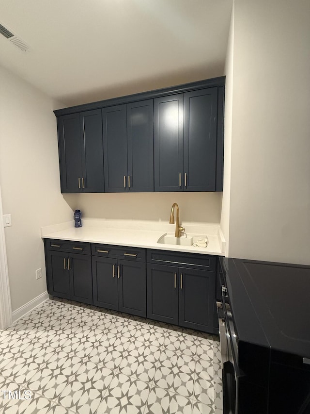 laundry area featuring sink