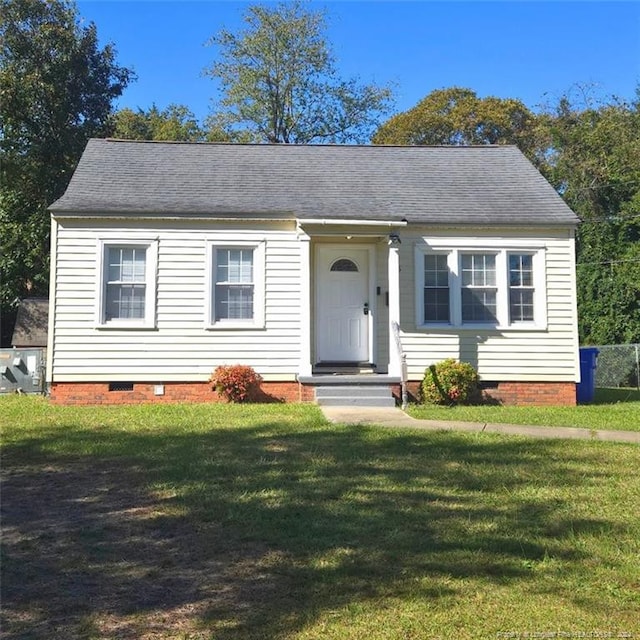 view of front of home with a front yard