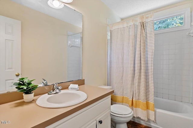 full bathroom featuring vanity, toilet, a textured ceiling, and shower / tub combo with curtain