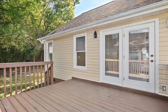 wooden deck featuring french doors