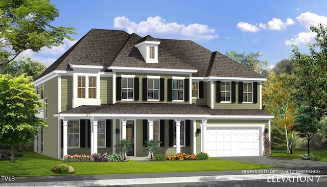 view of front of home featuring a garage and a front lawn