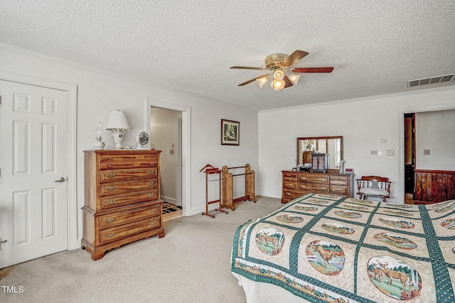 2554 Davis Mill Rd, Fremont, NC 27830 - carpeted bedroom featuring crown molding, a textured ceiling, and ceiling fan