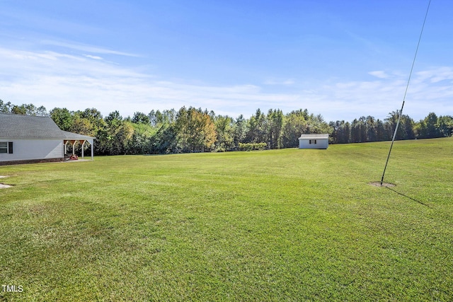 2554 Davis Mill Rd, Fremont, NC 27830 - view of green lawn featuring an outbuilding and a storage shed