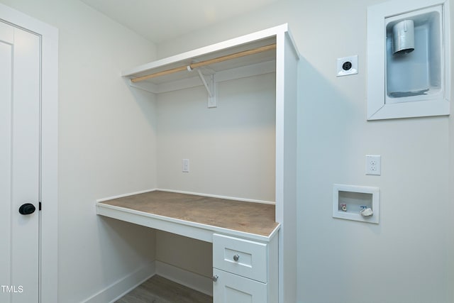 washroom with hookup for an electric dryer, wood-type flooring, and hookup for a washing machine