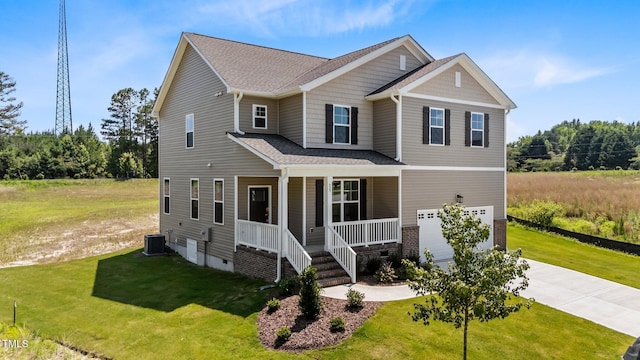 15 Diamond Creek Dr, Zebulon, NC 27597 - craftsman house with a porch, concrete driveway, a front lawn, an attached garage, and roof with shingles