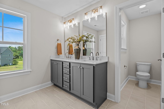 15 Diamond Creek Dr, Zebulon, NC 27597 - bathroom featuring double vanity and tile patterned flooring