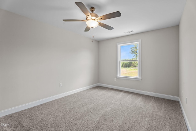 15 Diamond Creek Dr, Zebulon, NC 27597 - carpeted spare room with a ceiling fan and baseboards