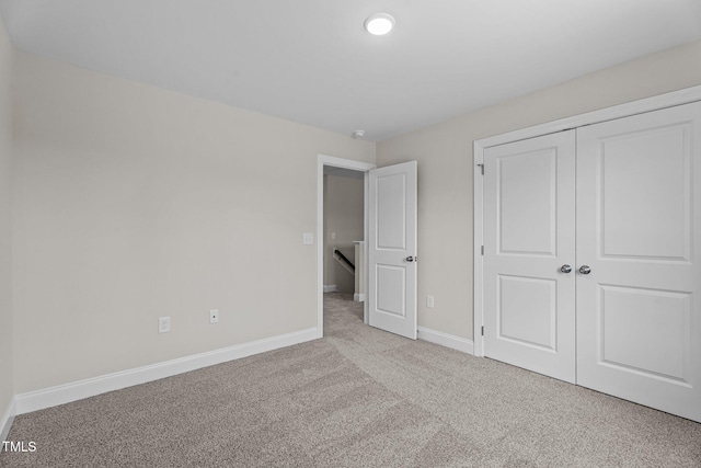 15 Diamond Creek Dr, Zebulon, NC 27597 - unfurnished bedroom featuring carpet and a closet
