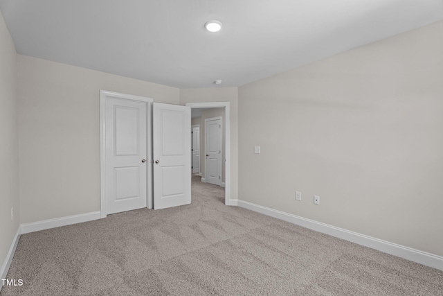 15 Diamond Creek Dr, Zebulon, NC 27597 - unfurnished bedroom with light carpet and a closet