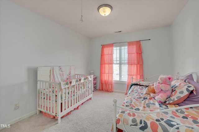 bedroom featuring carpet