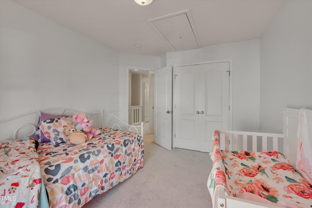 carpeted bedroom featuring a closet