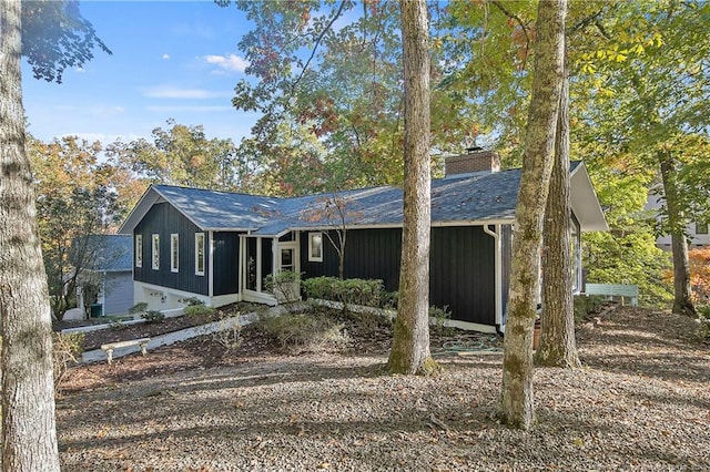 view of front of property featuring a sunroom