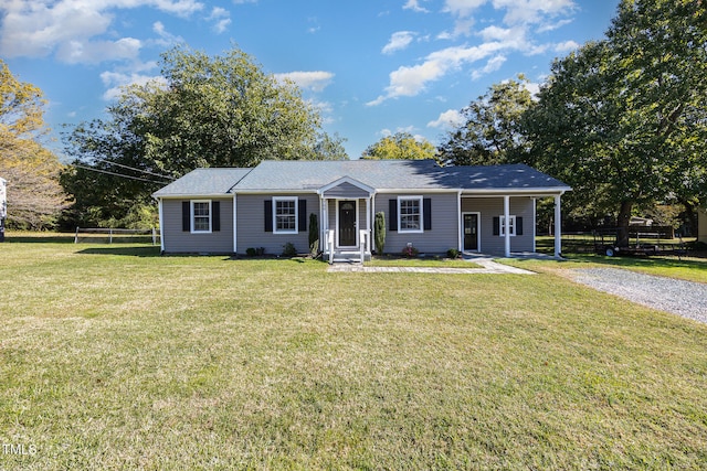 ranch-style house with a front lawn