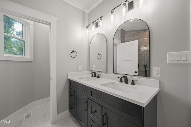 bathroom featuring tiled shower, vanity, and ornamental molding