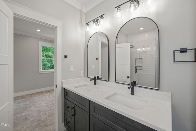 bathroom featuring vanity, an enclosed shower, and crown molding