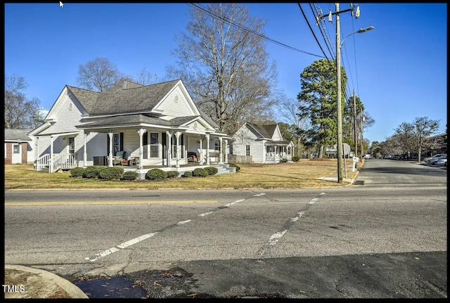 view of front of property featuring covered porch