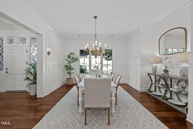 dining room featuring crown molding and dark hardwood / wood-style floors