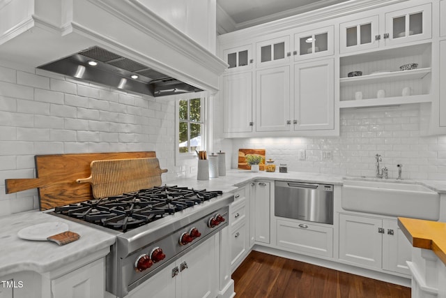 kitchen with stainless steel gas cooktop, dark hardwood / wood-style floors, sink, white cabinetry, and light stone counters