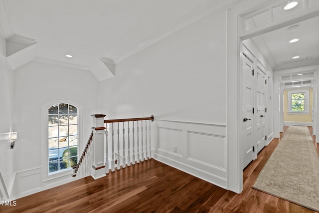 hall featuring hardwood / wood-style flooring and ornamental molding