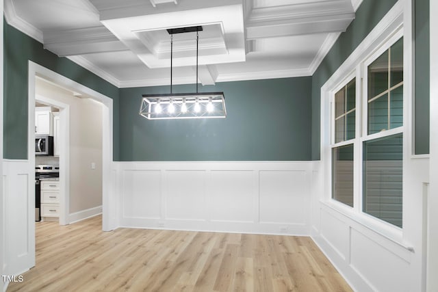 unfurnished dining area featuring crown molding, beamed ceiling, coffered ceiling, and light wood-type flooring