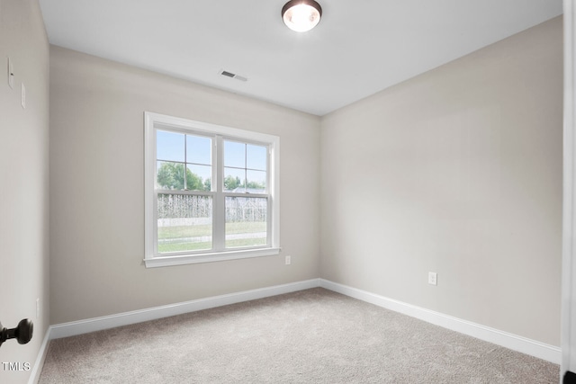 empty room featuring carpet