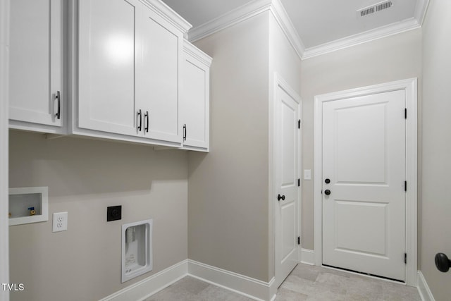 clothes washing area featuring cabinets, hookup for an electric dryer, hookup for a washing machine, and crown molding