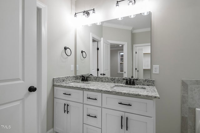 bathroom with vanity and crown molding