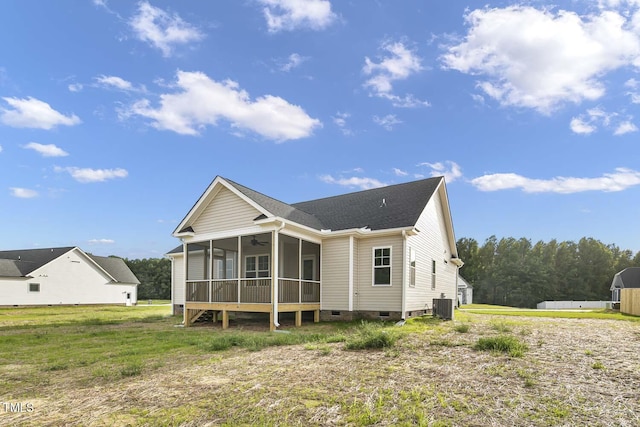 back of house with a sunroom, a shingled roof, ceiling fan, and central AC