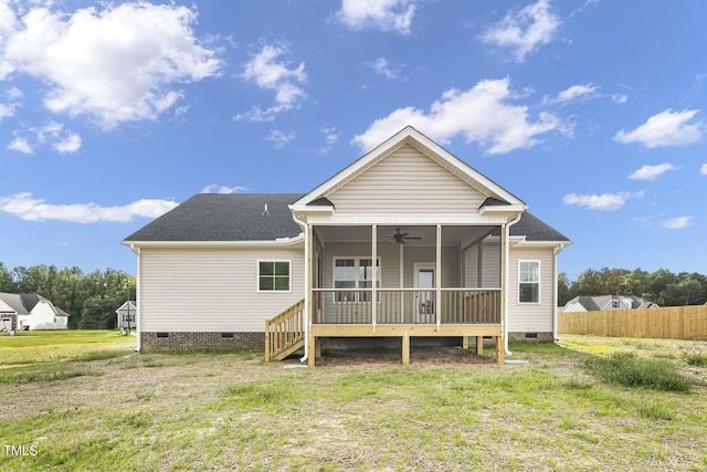 back of house featuring fence, crawl space, a yard, a wooden deck, and a ceiling fan
