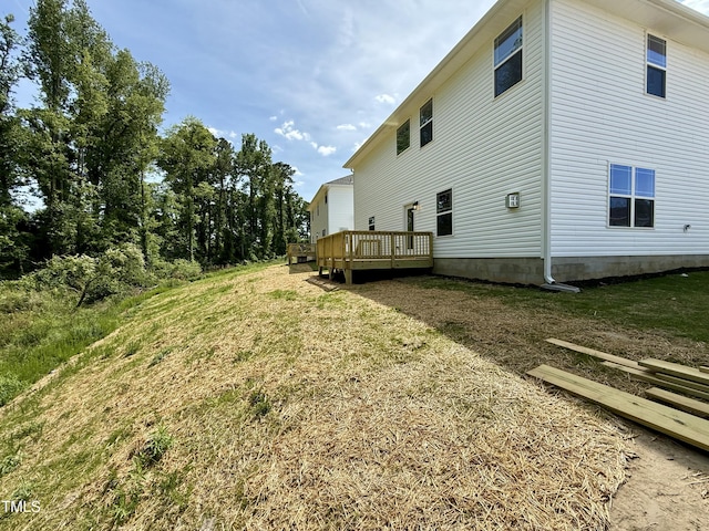 rear view of property with a deck