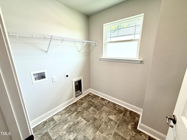 laundry area featuring baseboards, laundry area, electric dryer hookup, and hookup for a washing machine
