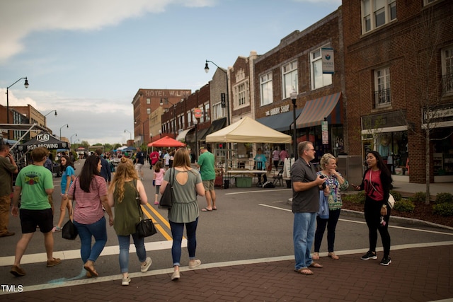 view of home's community featuring uncovered parking