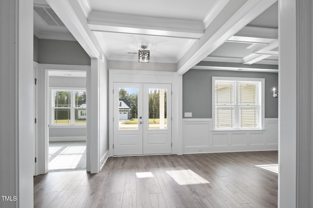 foyer with hardwood / wood-style flooring, beamed ceiling, crown molding, coffered ceiling, and french doors