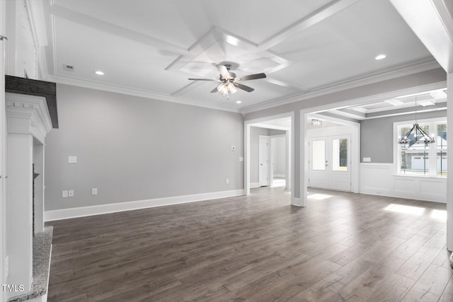 unfurnished living room featuring ceiling fan with notable chandelier, crown molding, and dark hardwood / wood-style flooring