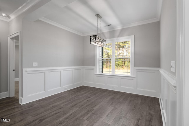 unfurnished dining area featuring ornamental molding and dark wood-type flooring