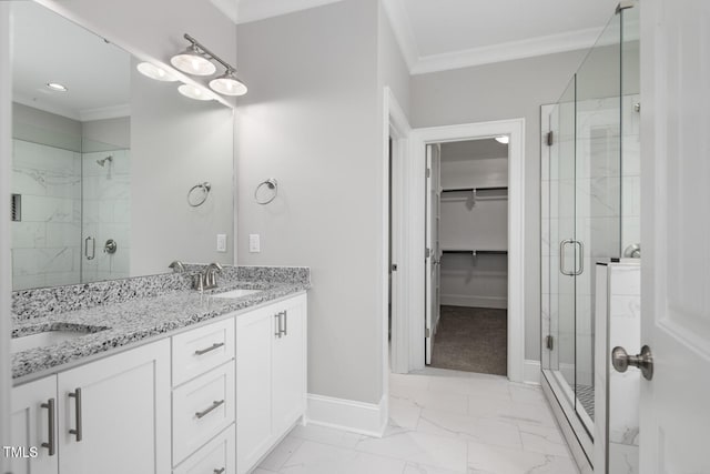 bathroom featuring walk in shower, vanity, and crown molding