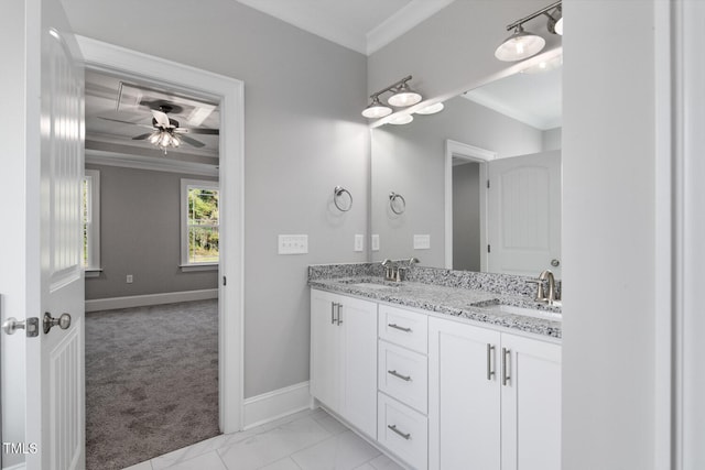 bathroom with ornamental molding, vanity, and ceiling fan