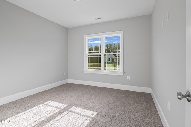 unfurnished room featuring carpet floors